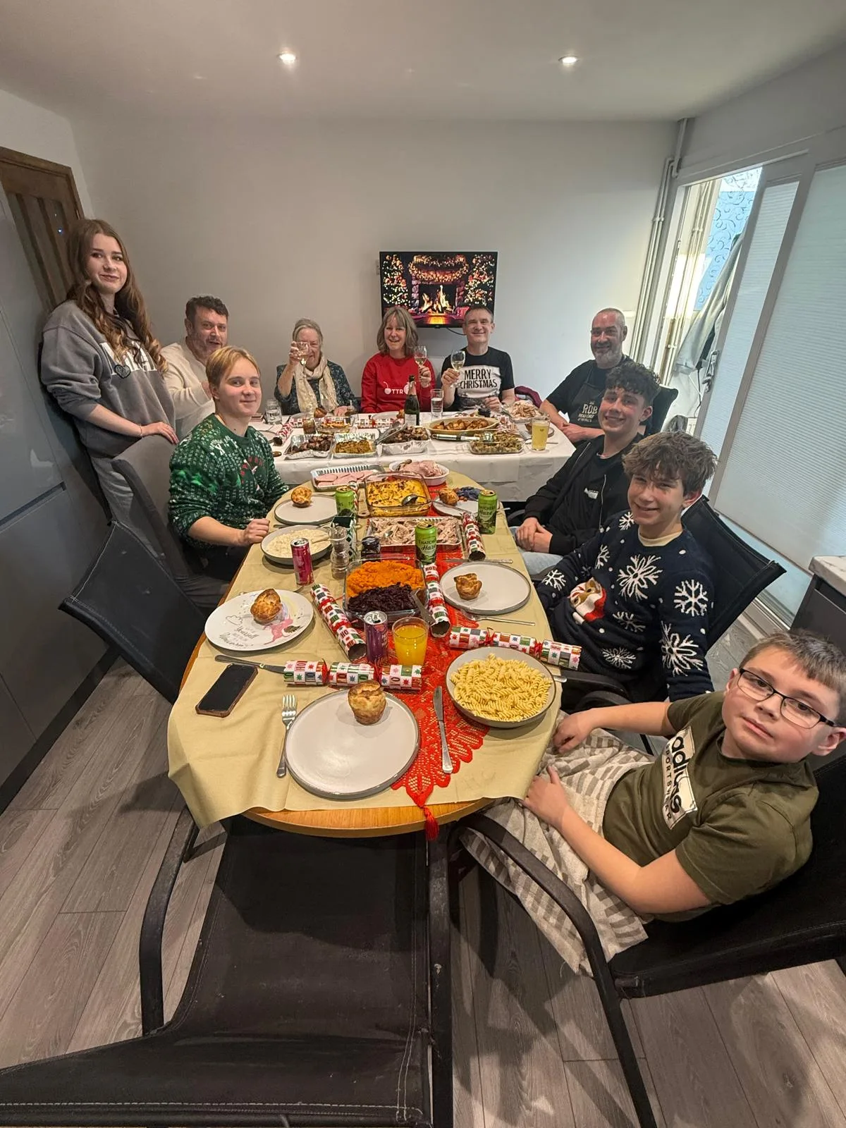The whole family around the Christmas dinner table.