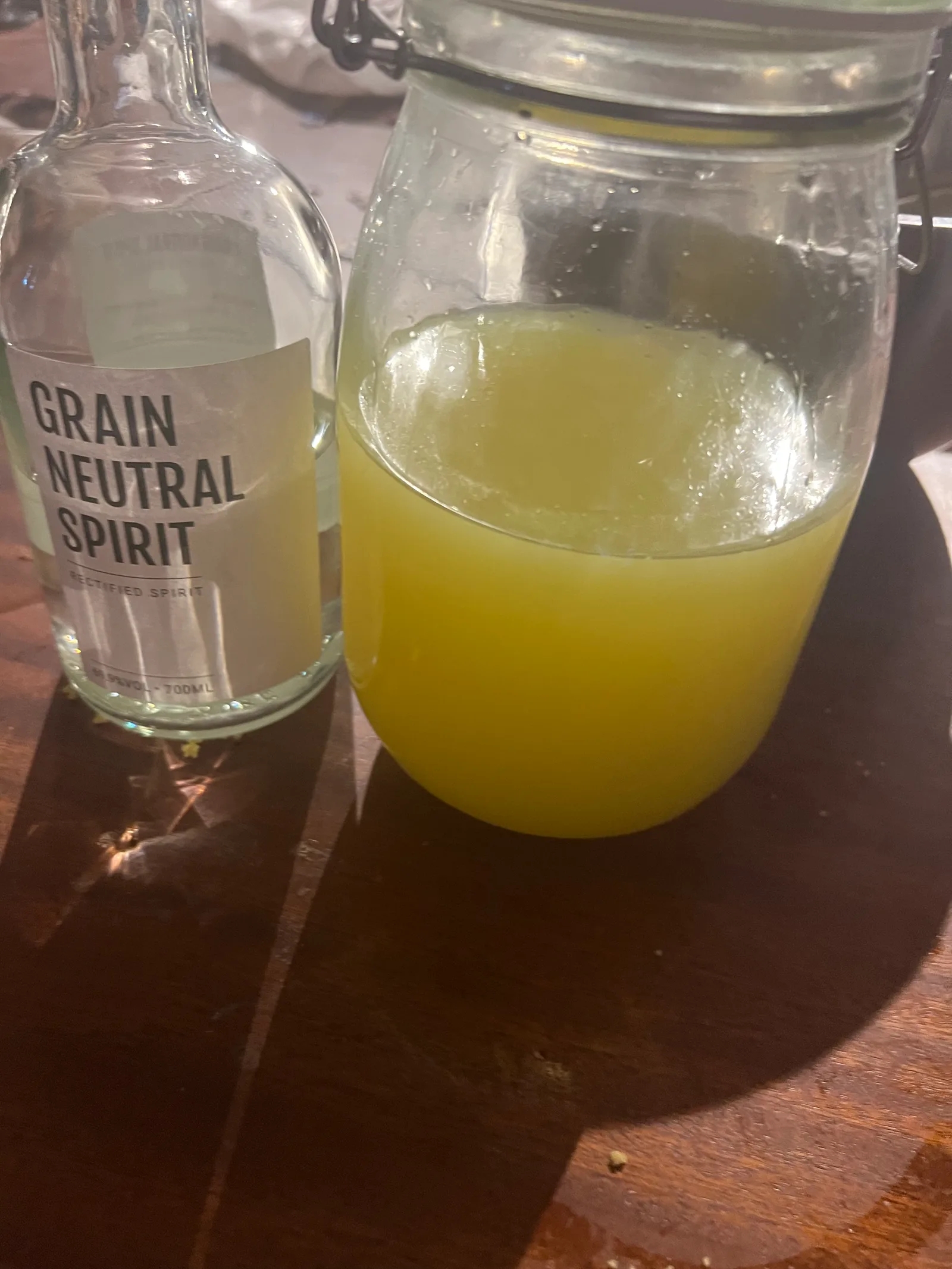 Cloudy yellow limoncello ready to bottle.