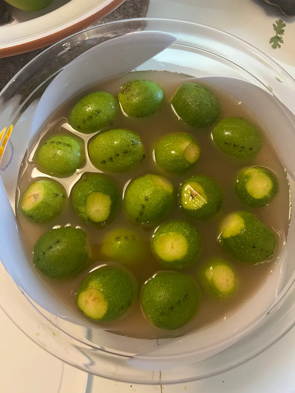 Green walnuts in brine.