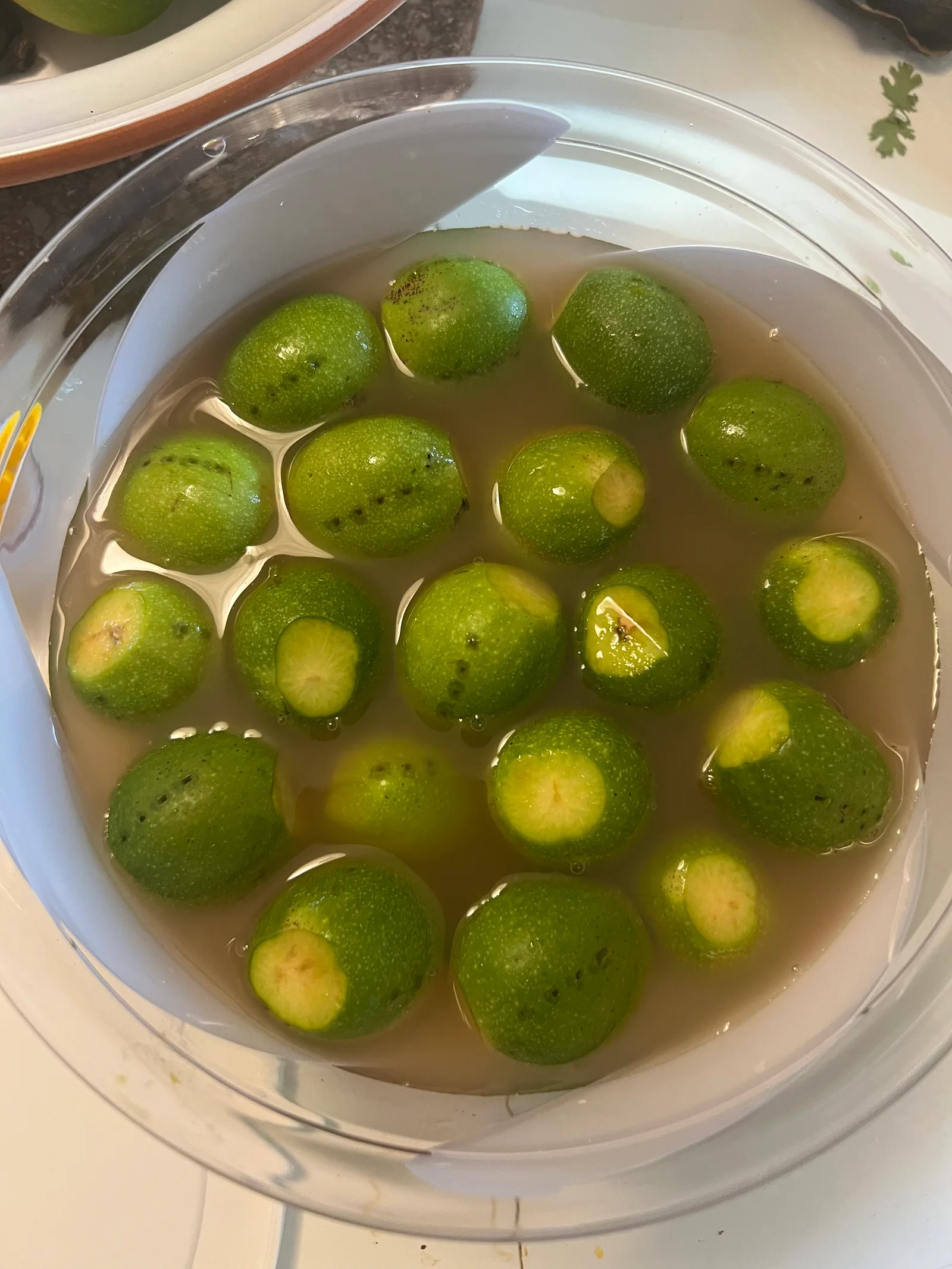 Green walnuts in brine.